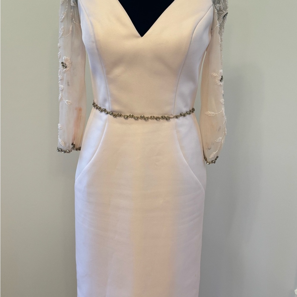 Elegant White Dress with Embellished Sleeves